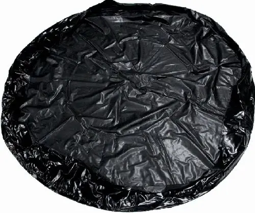 Schwarze, runde Kunststoffabdeckung auf einem flachen Untergrund, geeignet für Wolf Produkte, um Schutz oder Abdeckung zu bieten.